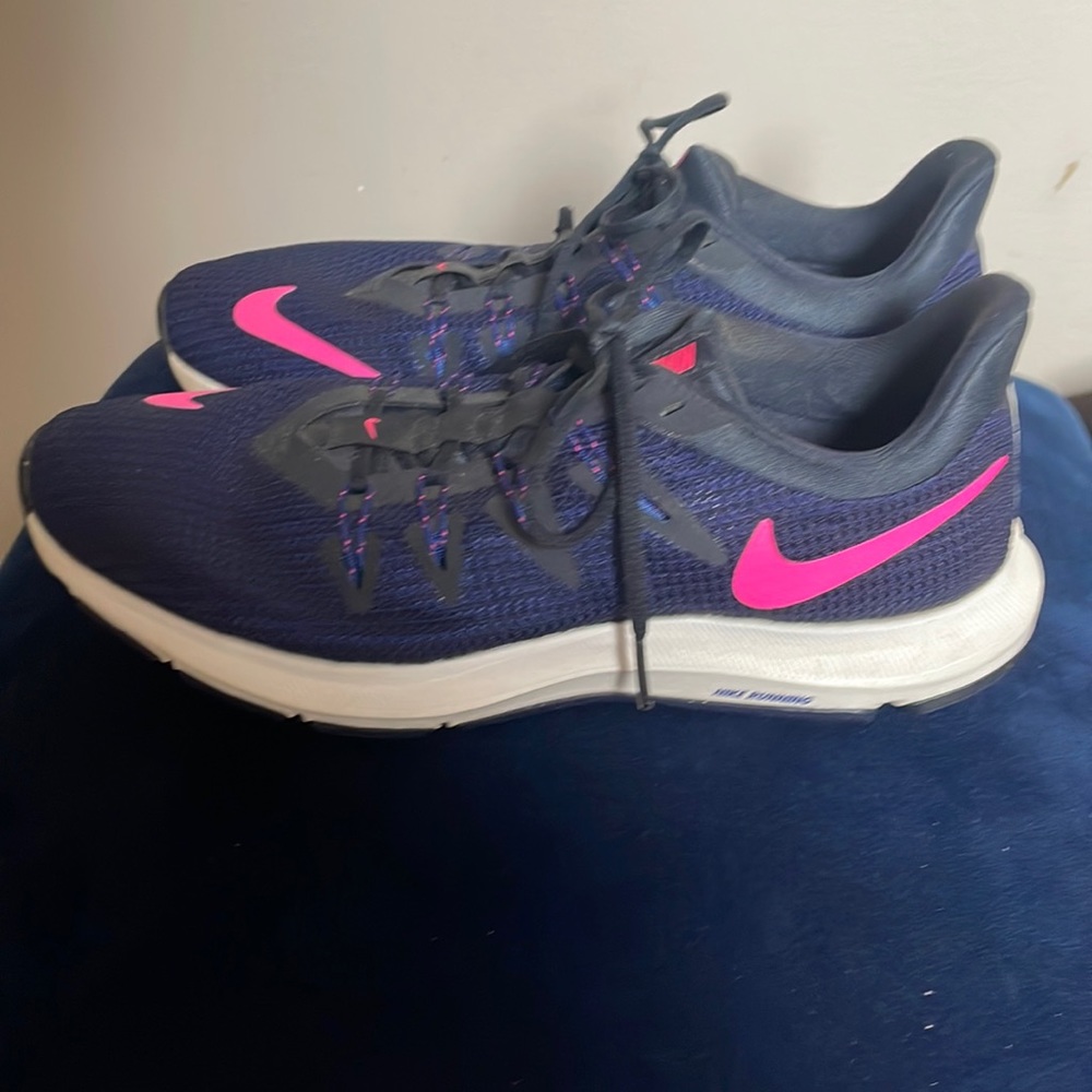 Nike running athletic shoes.